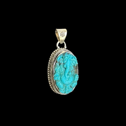 Colgante "Ananta" (अनन्त) Turquesa Iran Entallada Forma Ganesha Oval