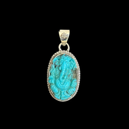 Colgante "Ananta" (अनन्त) Turquesa Iran Entallada Forma Ganesha Oval