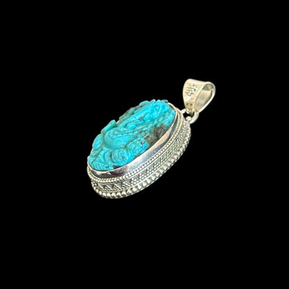 Colgante "Ananta" (अनन्त) Turquesa Iran Entallada Forma Ganesha Oval